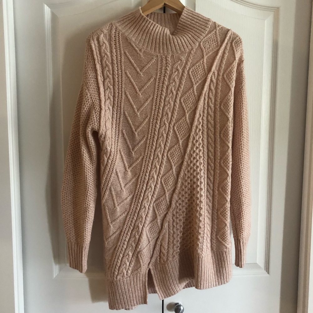 Asymmetrical knit design sweater/tunic with mock neck. Long, soft and comfy!